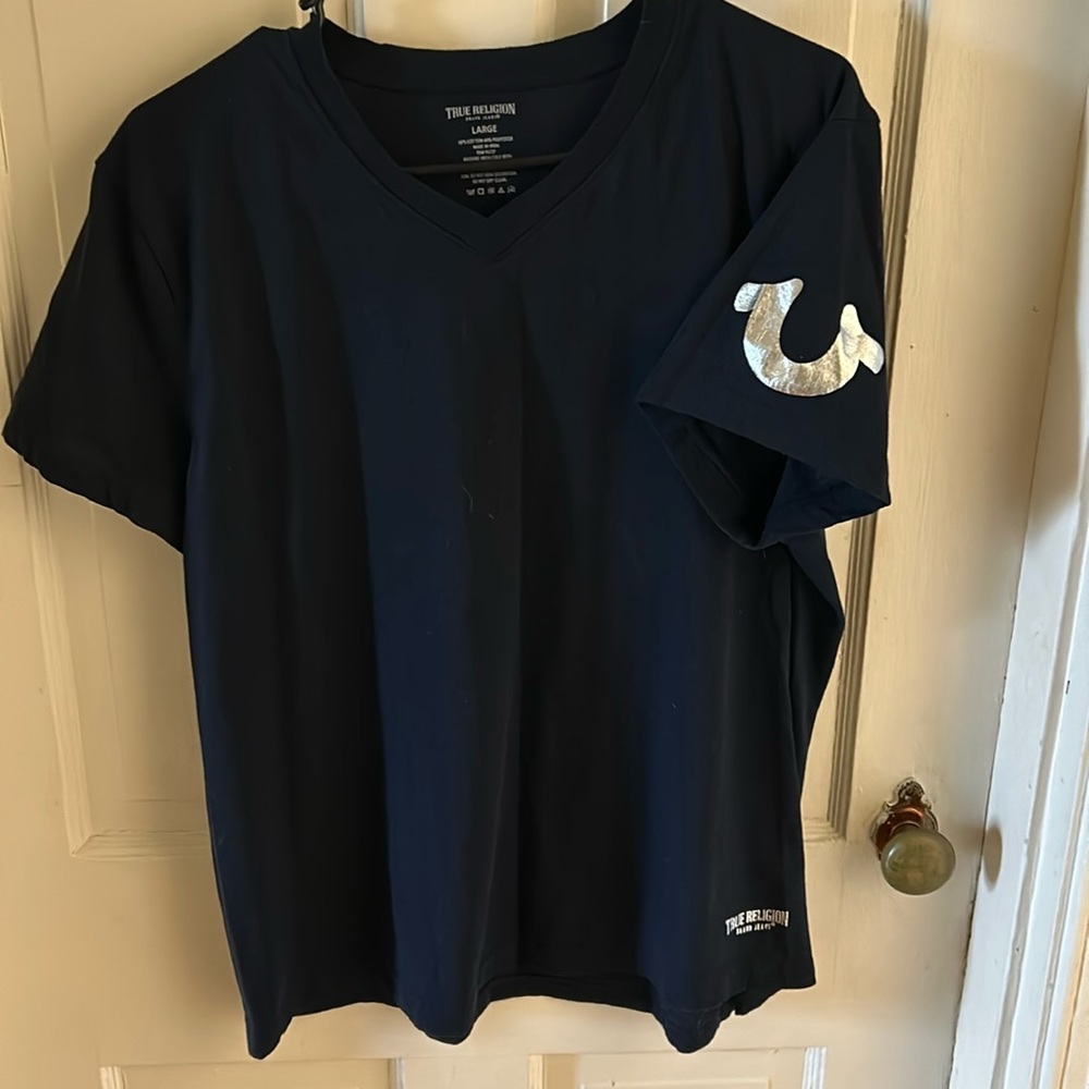 True religion tshirt. Women’s large/men’s medium.
